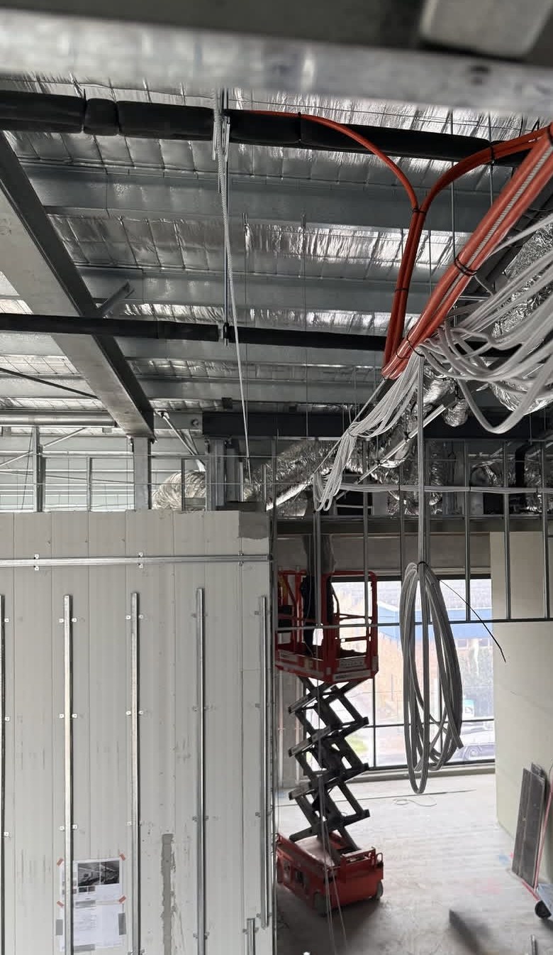 Cable installation and electrical fit-out inside a commercial build